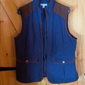 Navy blue vest with brown suede-like accents